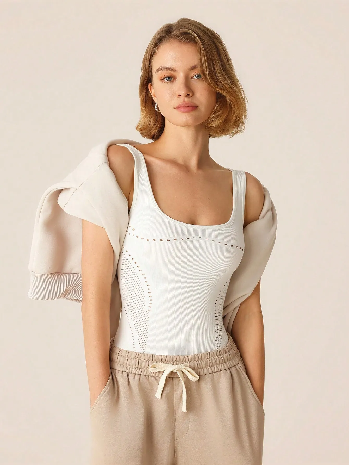 Sleek Hollow-Out Sleeveless Bodysuit – Stylish & Breathable Activewear
